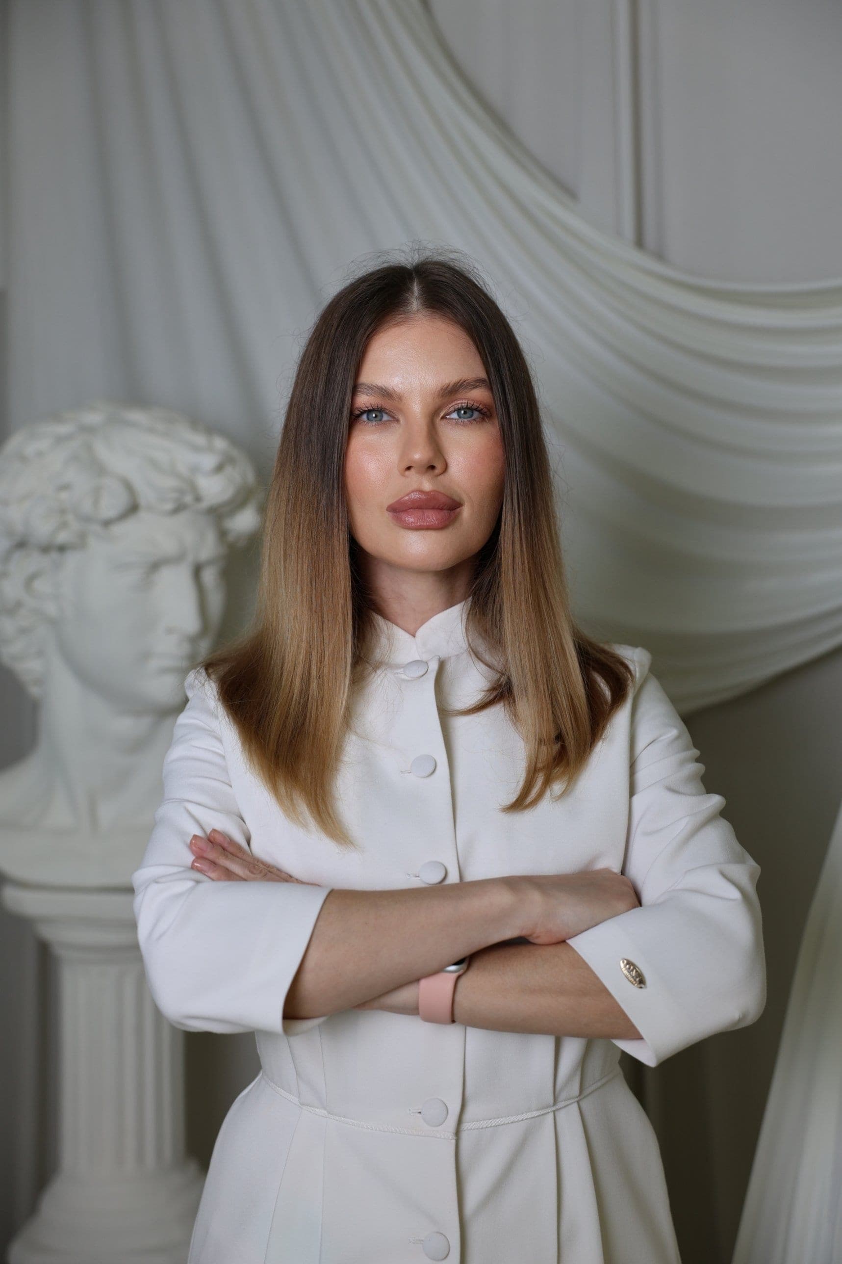 Dr Ekaterina Panteleeva in a white jacket, arms crossed